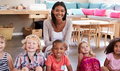 Happy teacher with happy students